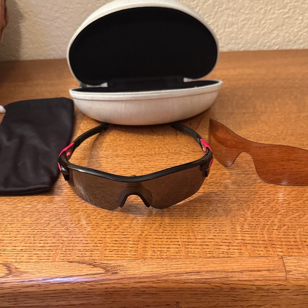 Oakley Sunglasses with Black Frame and Pink Highlights